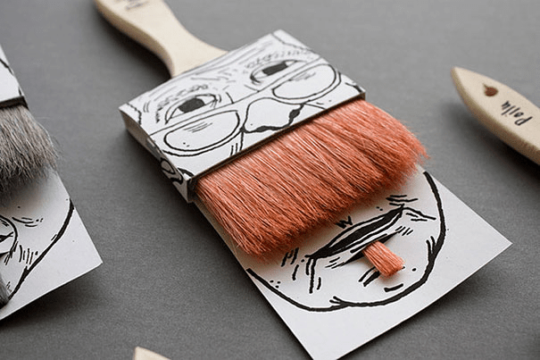 Een muurborstel in creatieve verpakking, met haren als een snor en baard.