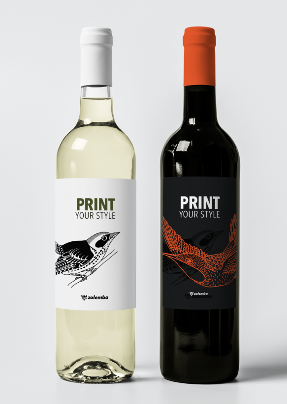 Two wine bottles, one black and one clear with white wine, labeled 'Print Your Style' with a bird illustration and Zolemba logo